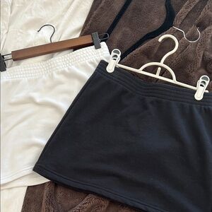 TNA Mini Skirts in Black and White